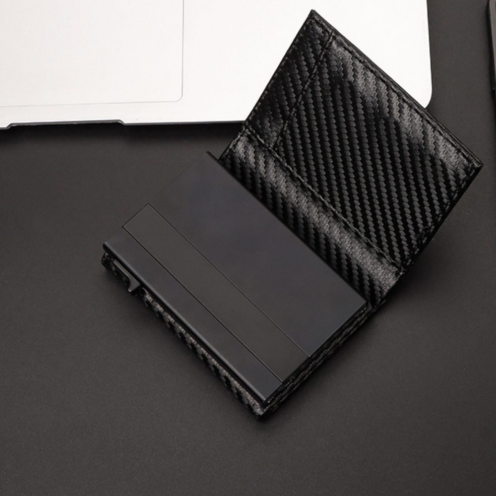 
                  
                    Porte Carte Carbone Noir
                  
                