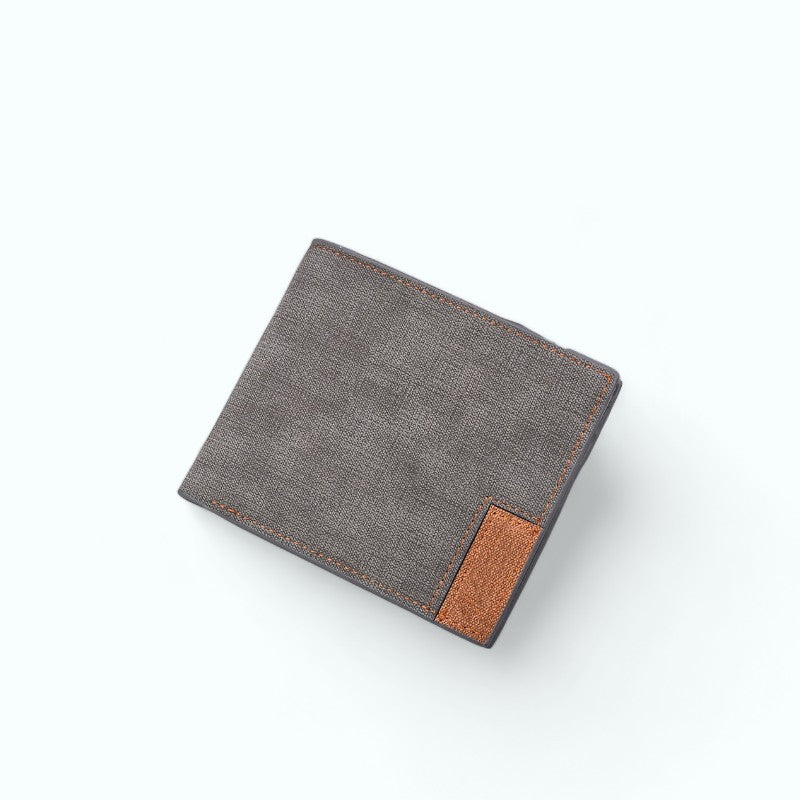 
                  
                    Portefeuille Homme en Tissu Gris
                  
                